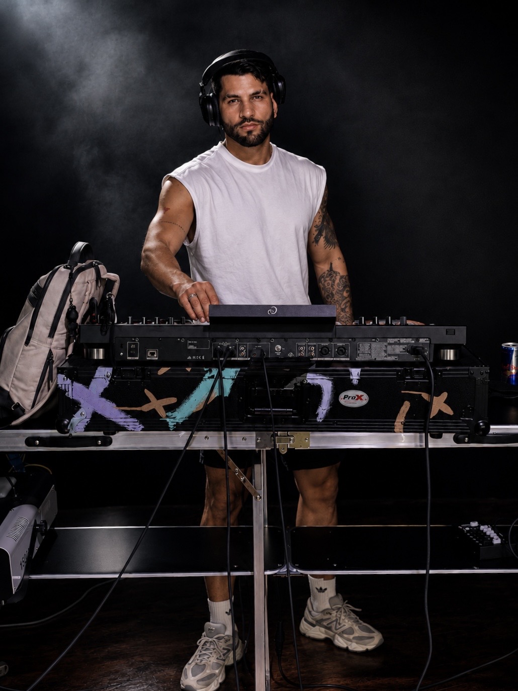 DJ Adriano Dolce performing behind the decks